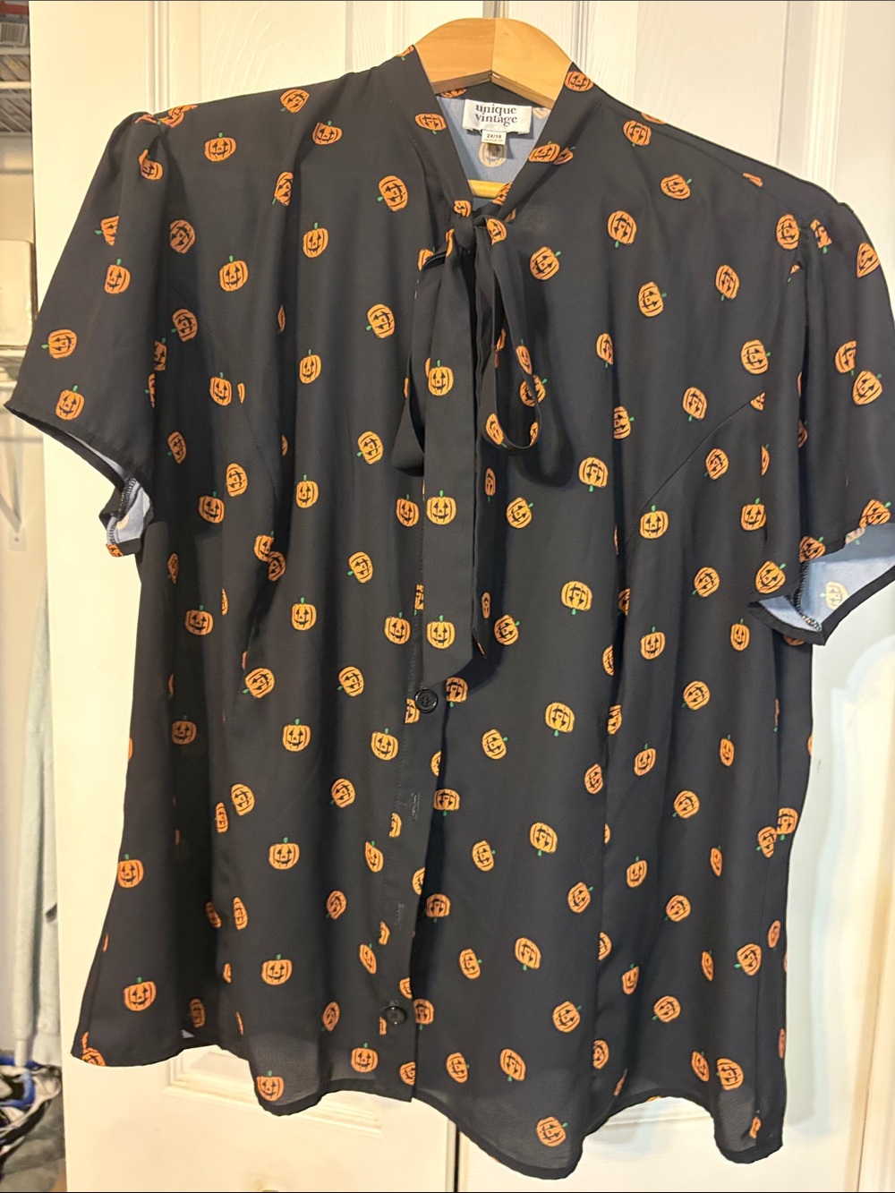 Unique Vintage Black Button-Front Shirt with Orange Pumpkin Print